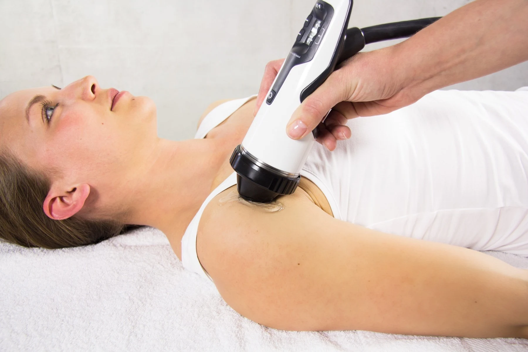 Shockwave treatment applied to a patient’s shoulder